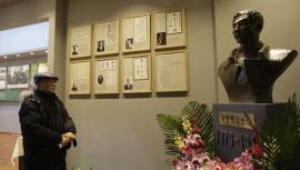 A visitor looking at exhibits at the Chinese memorial to the Korean assassin who killed Japan's first PM. © AFP